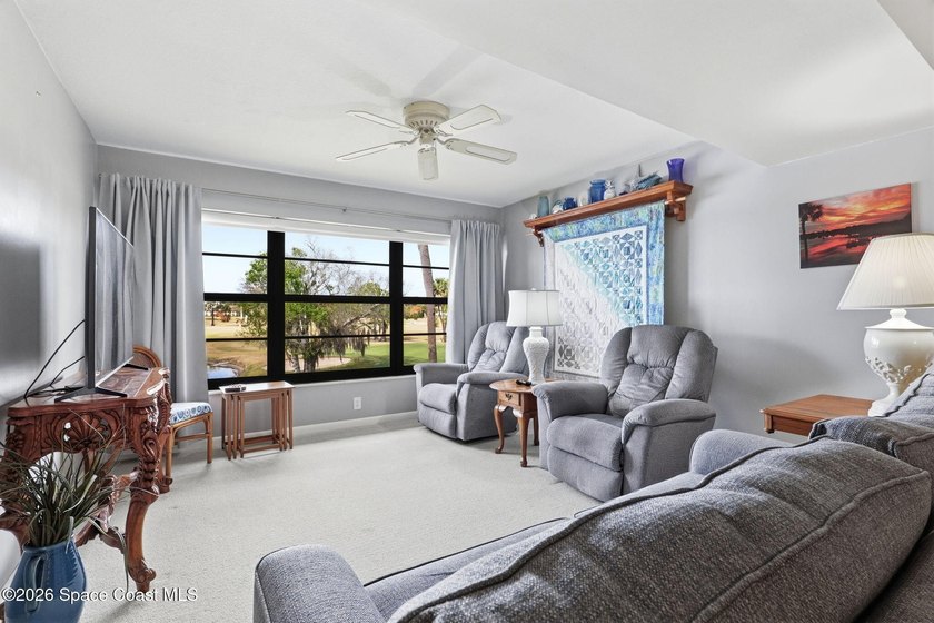 This beautifully updated 2bedroom 2bath condo offers serene pond - photo 4