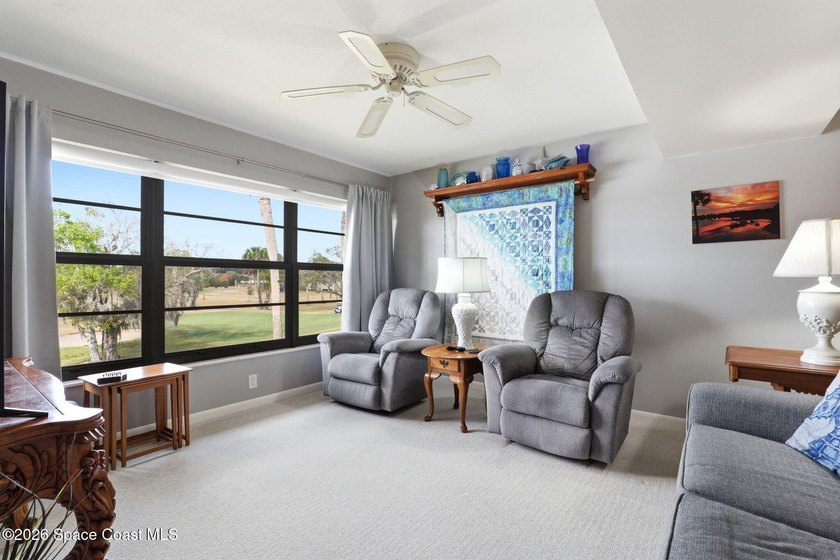 This beautifully updated 2bedroom 2bath condo offers serene pond - photo 5