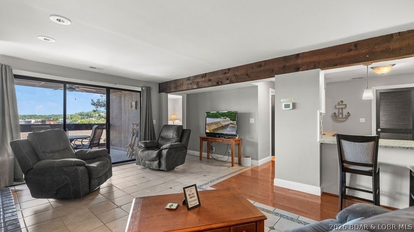 Turnkey Lakefront Living with a Dock Slip Included! Discover - photo 12