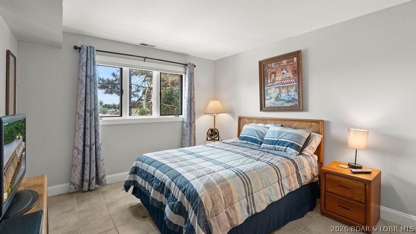 Turnkey Lakefront Living with a Dock Slip Included! Discover - photo 17