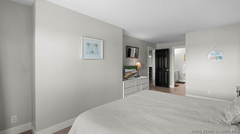 Turnkey Lakefront Living with a Dock Slip Included! Discover - photo 19