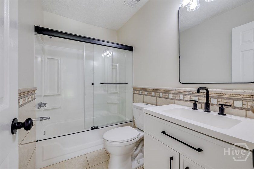 ** THIS HOME IS A MUST SEE WITH LOTS OF UPDATES! Welcome home to - photo 22