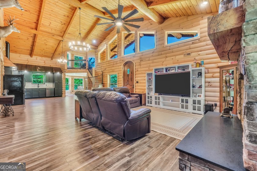 Beautifully custom-built log cabin style home privately situated - photo 12