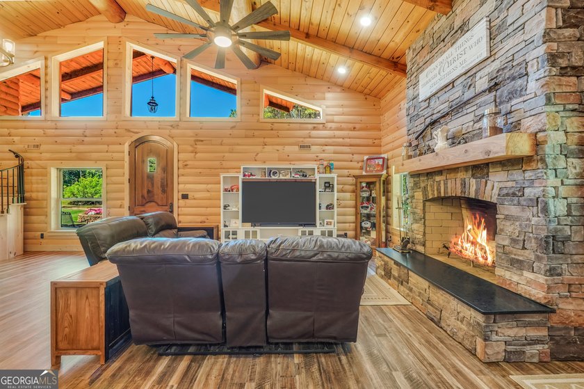 Beautifully custom-built log cabin style home privately situated - photo 13