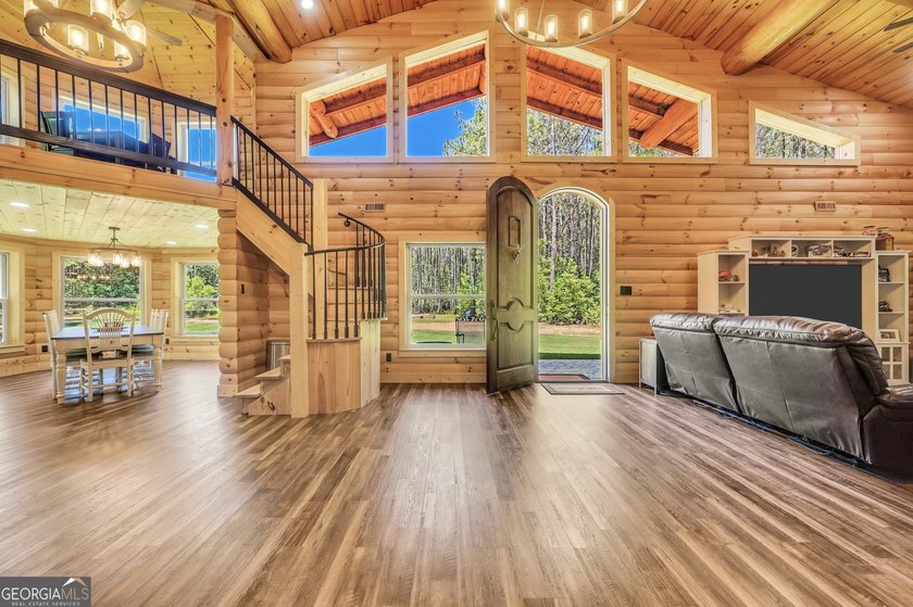 Beautifully custom-built log cabin style home privately situated - photo 18