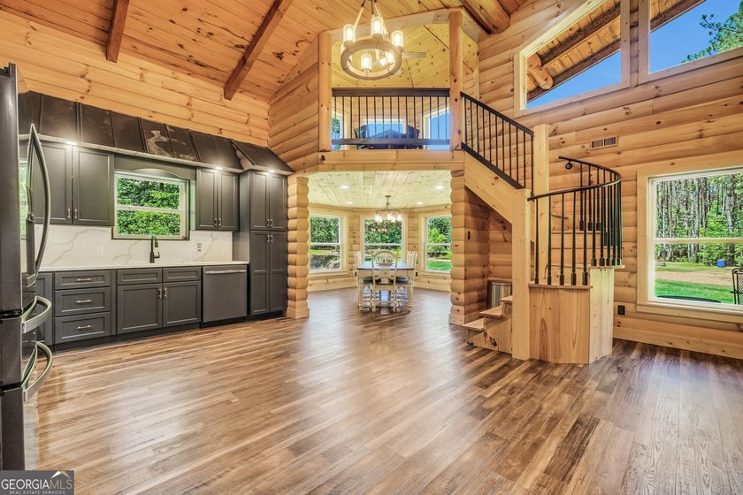 Beautifully custom-built log cabin style home privately situated - photo 24