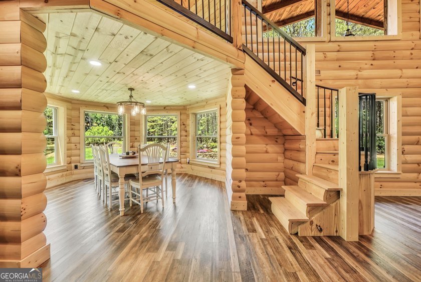 Beautifully custom-built log cabin style home privately situated - photo 26