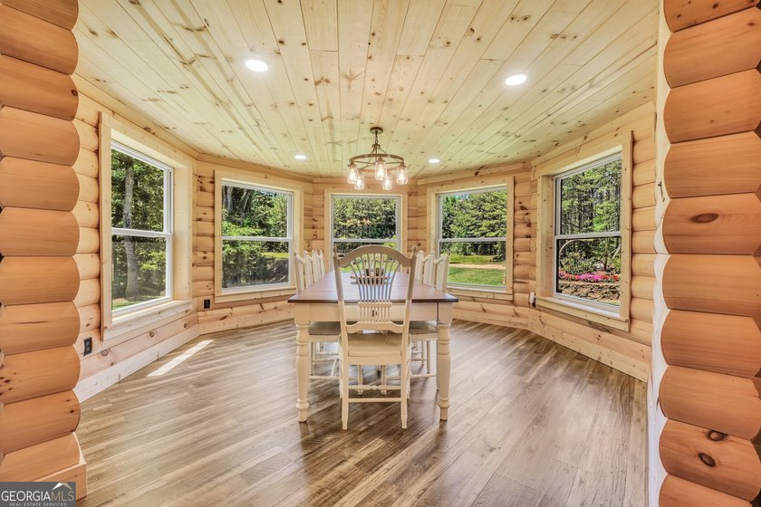 Beautifully custom-built log cabin style home privately situated - photo 27