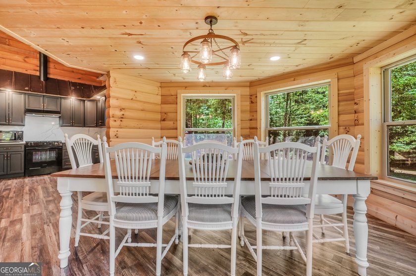 Beautifully custom-built log cabin style home privately situated - photo 28