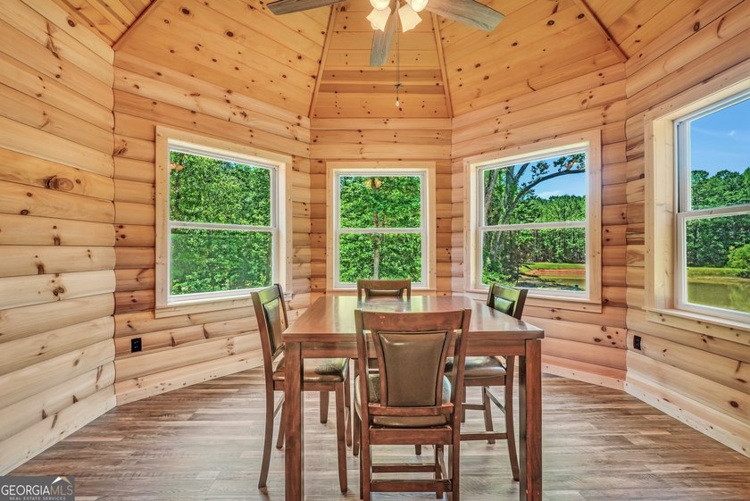 Beautifully custom-built log cabin style home privately situated - photo 29
