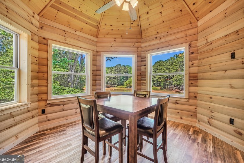 Beautifully custom-built log cabin style home privately situated - photo 30