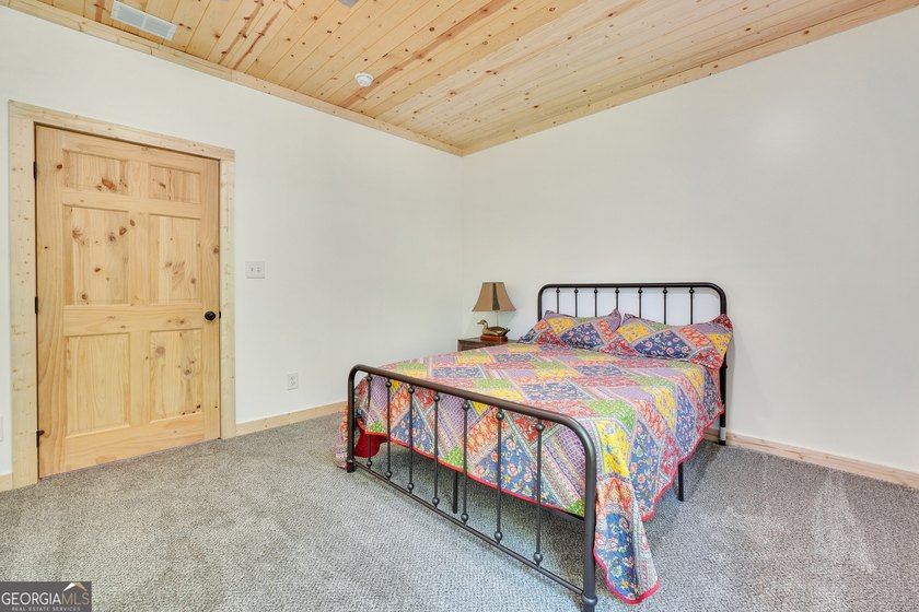 Beautifully custom-built log cabin style home privately situated - photo 36