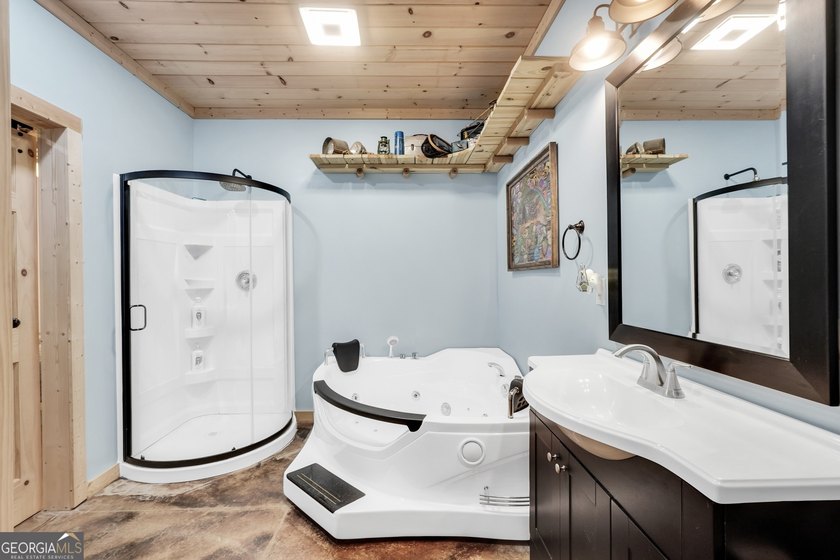 Beautifully custom-built log cabin style home privately situated - photo 41