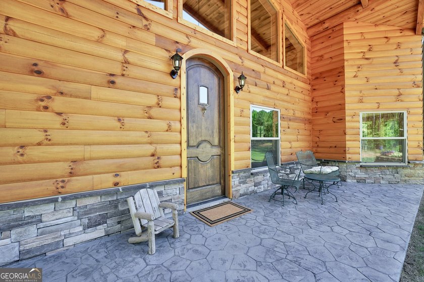 Beautifully custom-built log cabin style home privately situated - photo 44