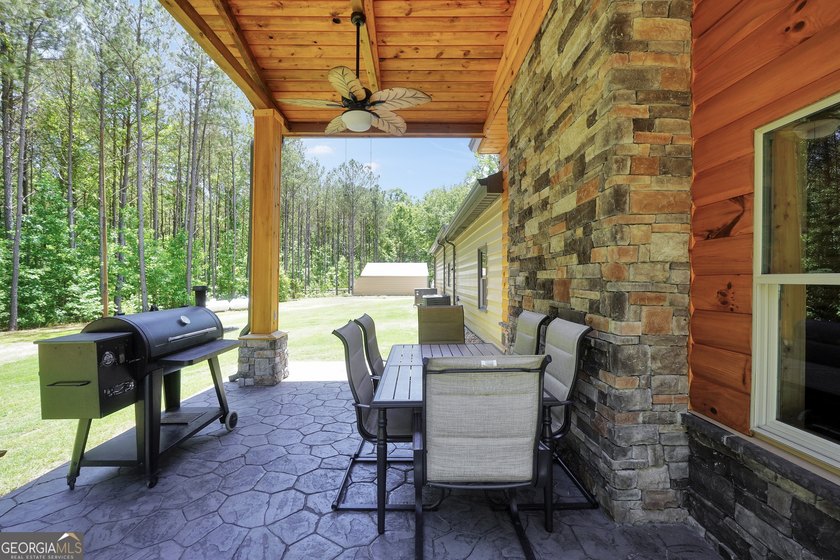 Beautifully custom-built log cabin style home privately situated - photo 48