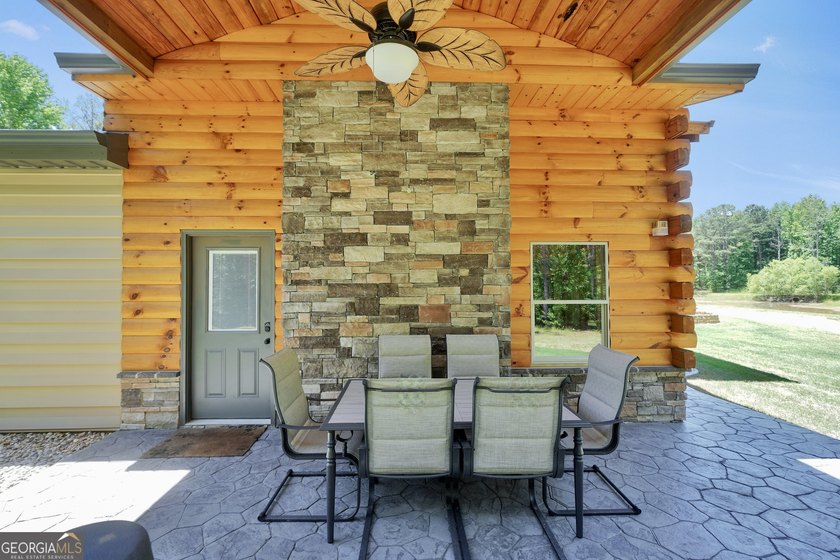 Beautifully custom-built log cabin style home privately situated - photo 49