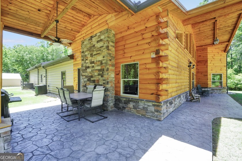Beautifully custom-built log cabin style home privately situated - photo 50