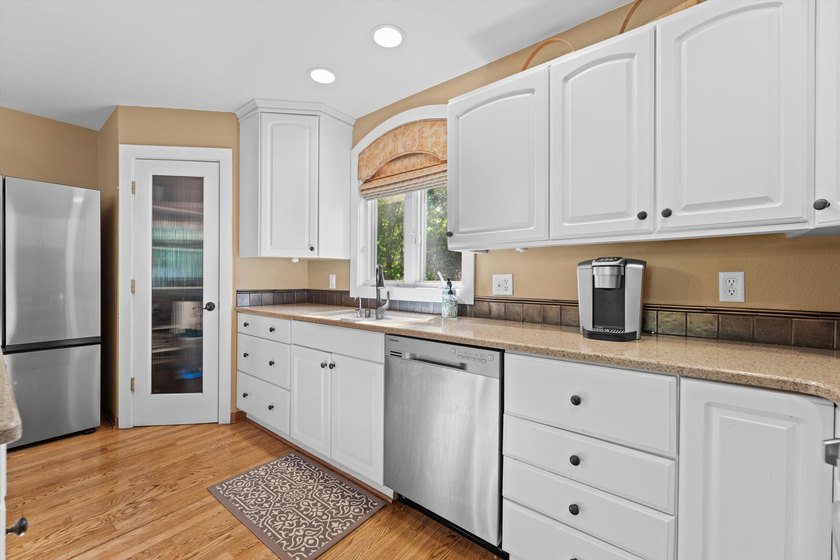 Lake living starts here! Nestled in the heart of Delafield, this - photo 9