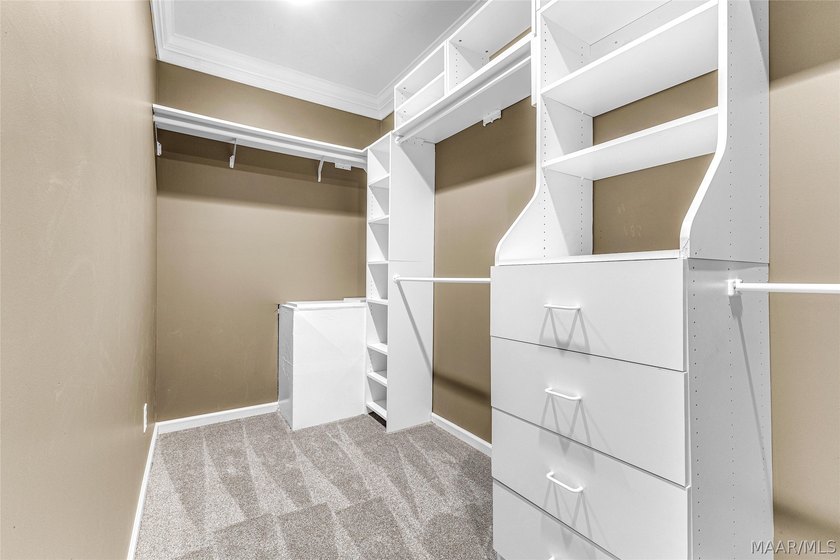 Hidden among nearly four private wooded acres, this custom - photo 38