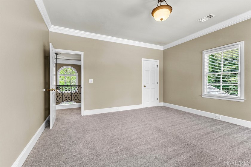 Hidden among nearly four private wooded acres, this custom - photo 47