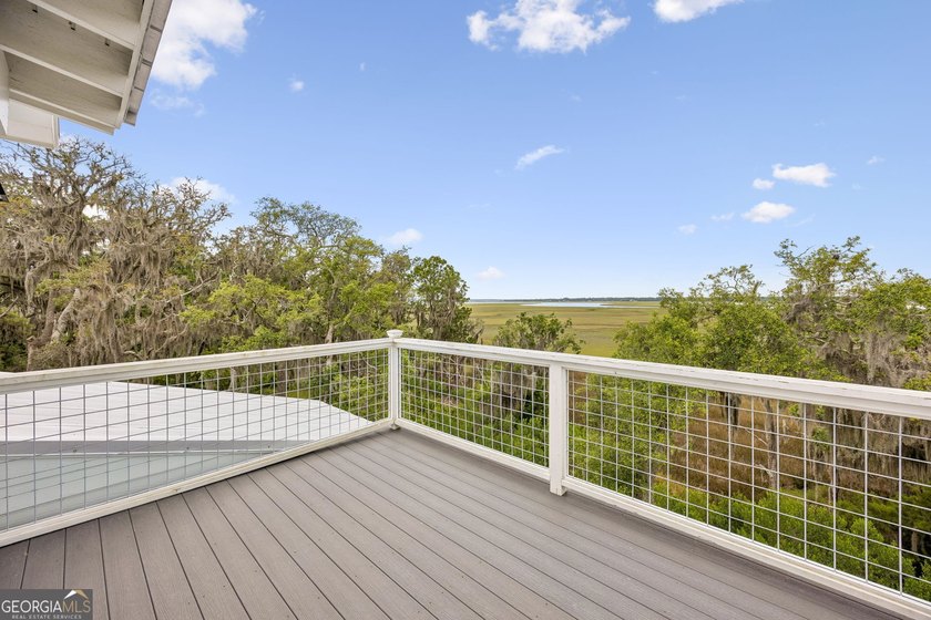 Beautiful marsh front coastal-style home surrounded by - photo 21