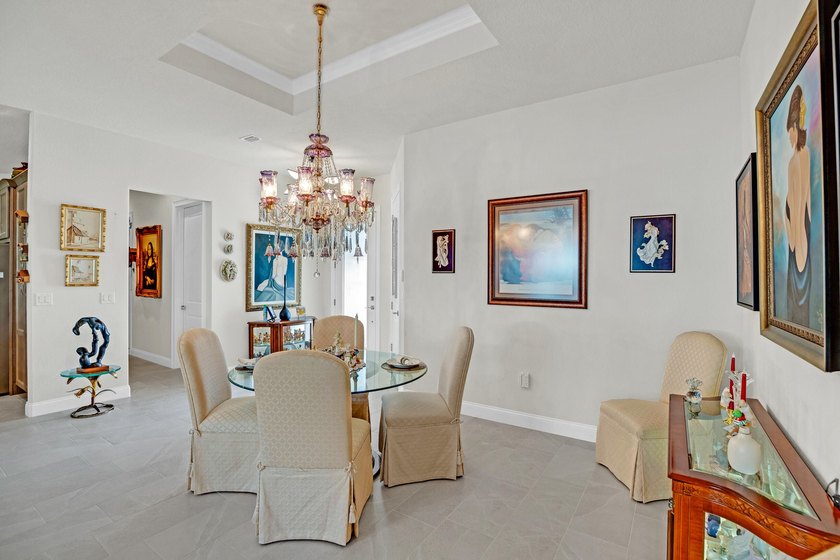 This stunning corner-lot home offers breathtaking lake views and - photo 6