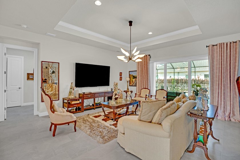 This stunning corner-lot home offers breathtaking lake views and - photo 8