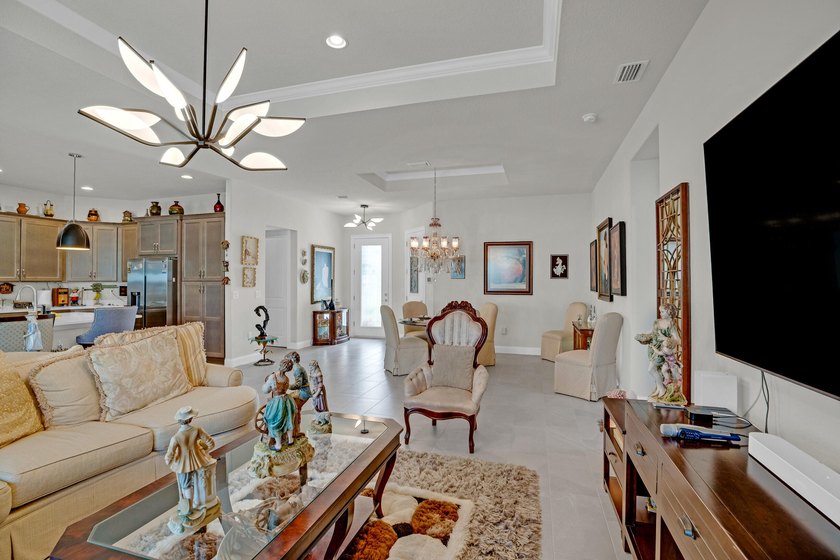 This stunning corner-lot home offers breathtaking lake views and - photo 10