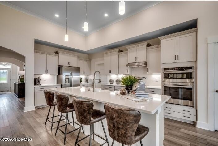 The Fullerton is a two-story Craftsman-style home offering three - photo 6