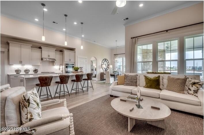 The Fullerton is a two-story Craftsman-style home offering three - photo 7