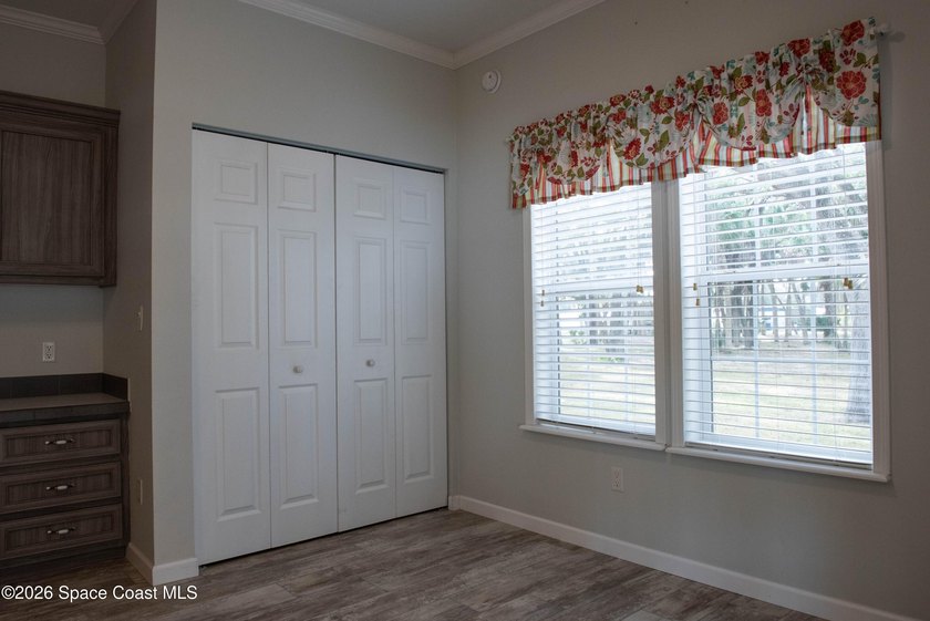 Welcome home to this charming 3-bedroom, 2-bath residence in the - photo 5