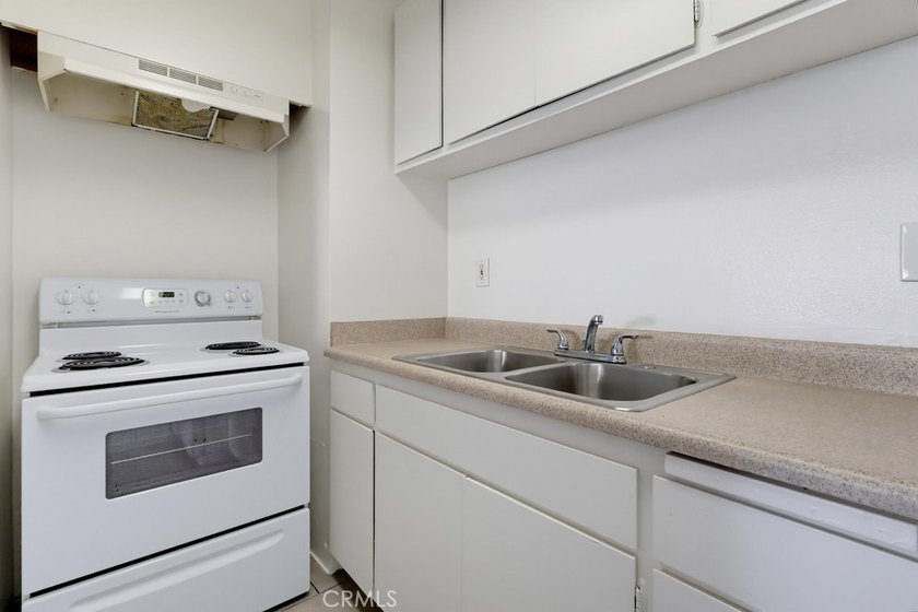 Don't miss this ground level studio condo with inside view of - photo 12