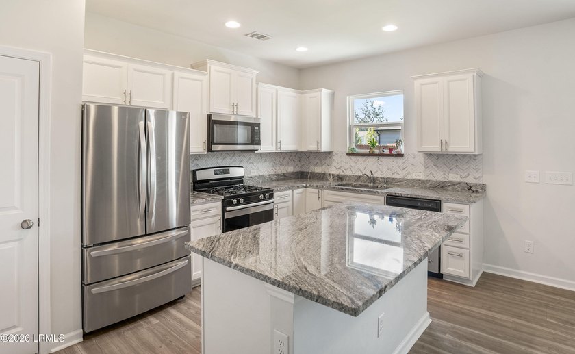 Welcome to 1 Toxaway Lane, where modern comfort meets Lowcountry - photo 13