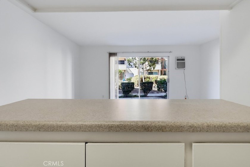 Don't miss this ground level studio condo with inside view of - photo 13