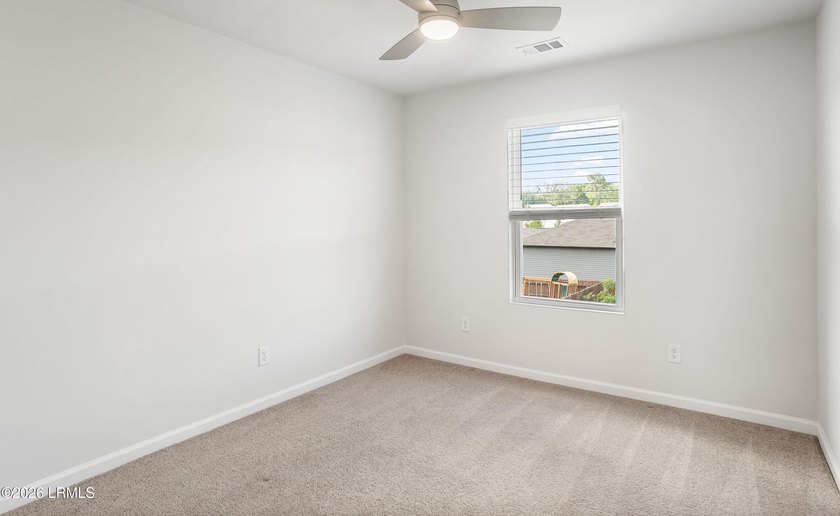 Welcome to 1 Toxaway Lane, where modern comfort meets Lowcountry - photo 24