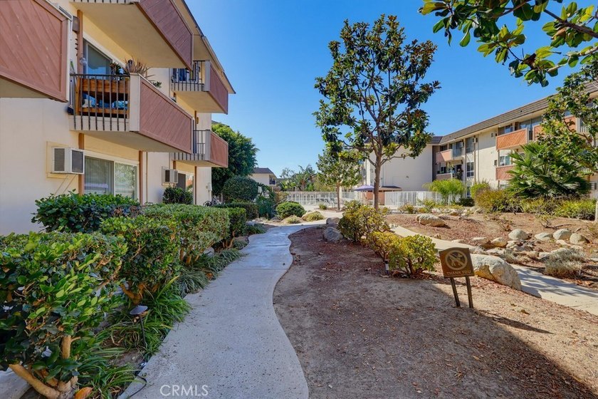 Don't miss this ground level studio condo with inside view of - photo 27