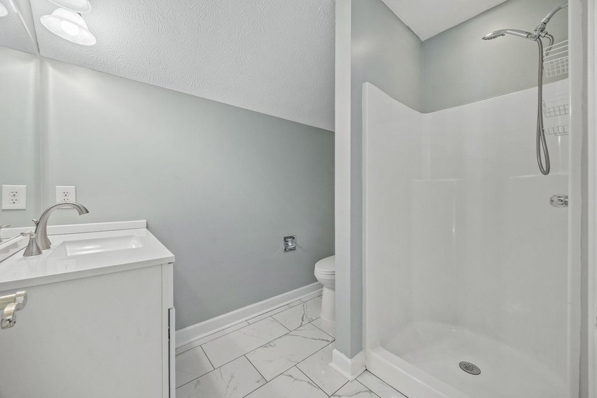 Welcome to this beautifully updated all-brick home in the highly - photo 36