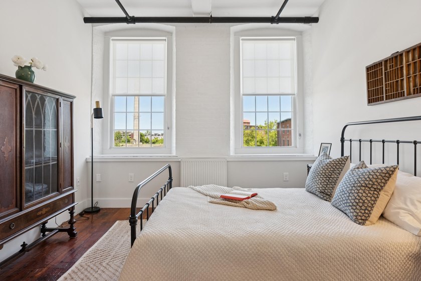 Welcome home to this spacious two bedroom condo overlooking the - photo 3