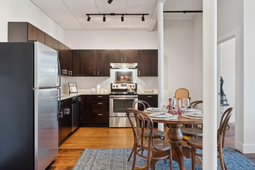 Welcome home to this spacious two bedroom condo overlooking the - photo 7