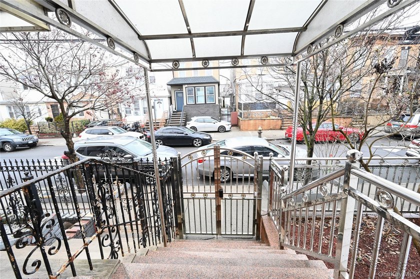 MOVE RIGHT INTO THIS WELL MAINTAINED 2 FAMILY SEMI-ATTACHED HOME - photo 2