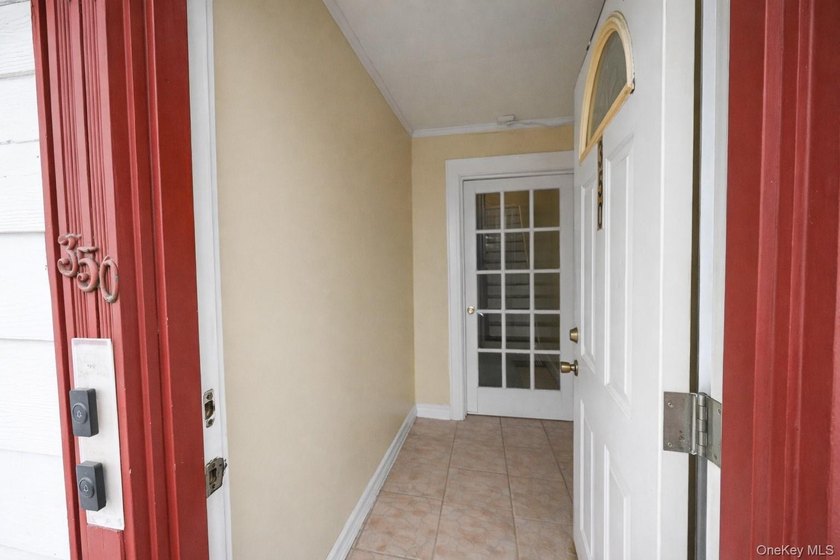 MOVE RIGHT INTO THIS WELL MAINTAINED 2 FAMILY SEMI-ATTACHED HOME - photo 3