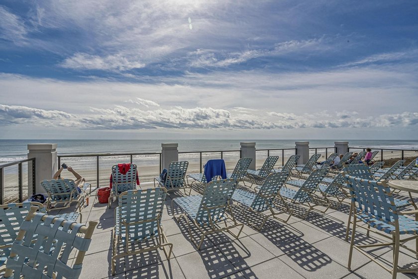 Experience coastal living in this bright and fully furnished - photo 24