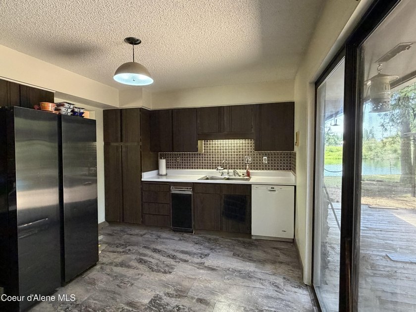 Enjoy waterfront living with this 3-bedroom, 2-bath home - photo 11