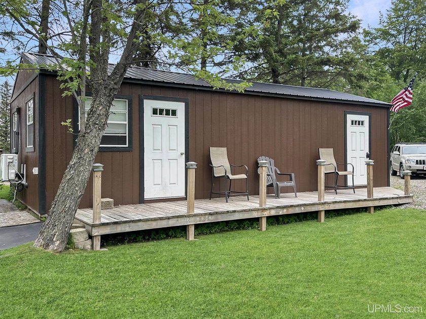 Experience true Northwoods living with this charming waterfront - photo 18