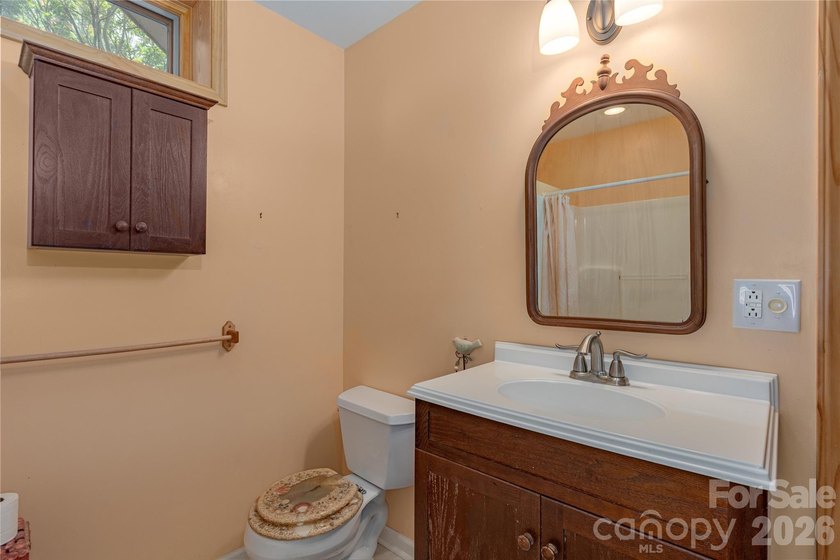 Tucked within a desirable lake community, this thoughtfully - photo 25