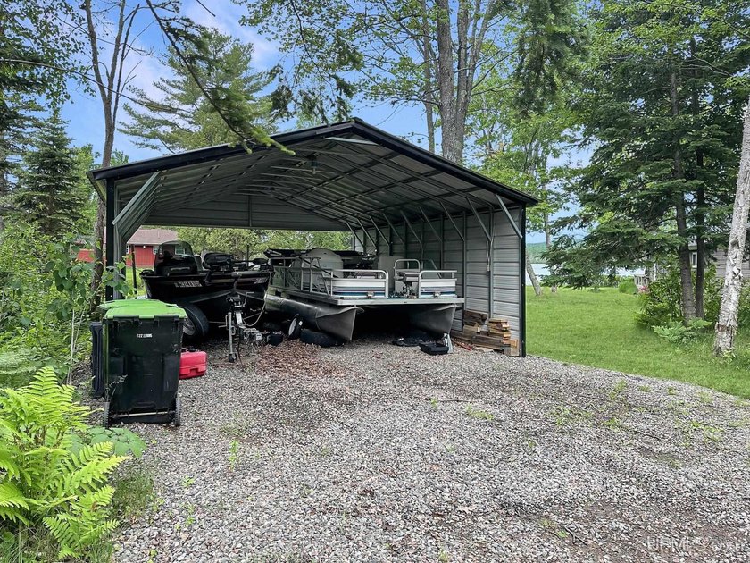 Experience true Northwoods living with this charming waterfront - photo 25
