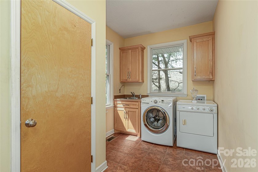 Tucked within a desirable lake community, this thoughtfully - photo 26