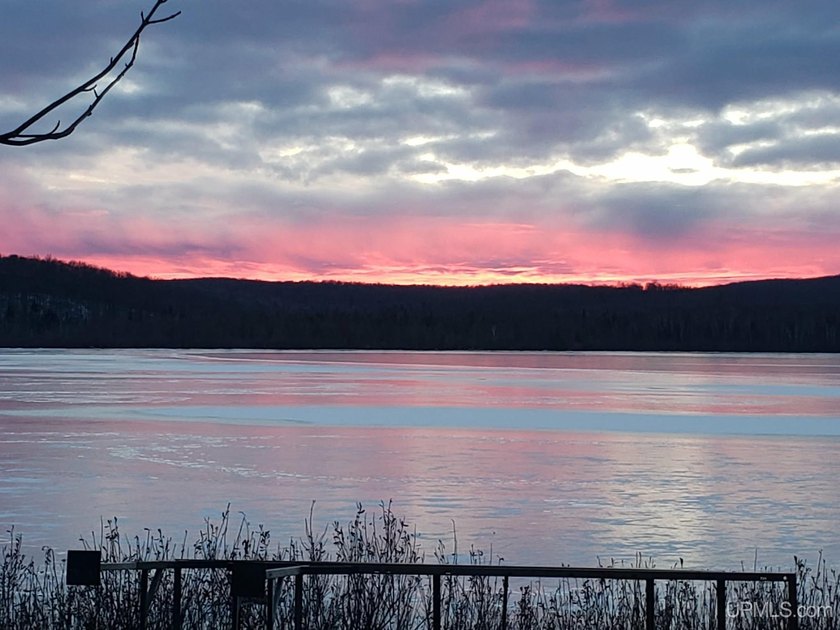 Experience true Northwoods living with this charming waterfront - photo 31