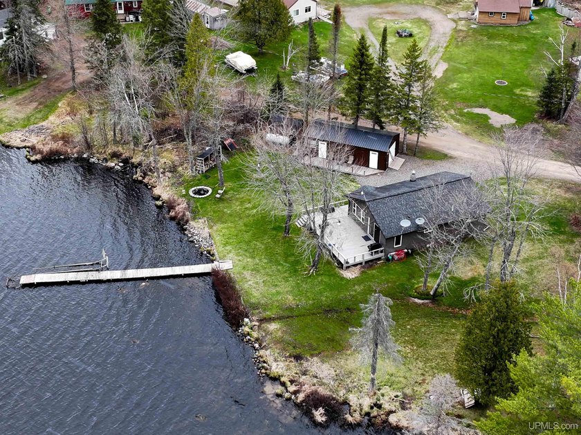 Experience true Northwoods living with this charming waterfront - photo 39