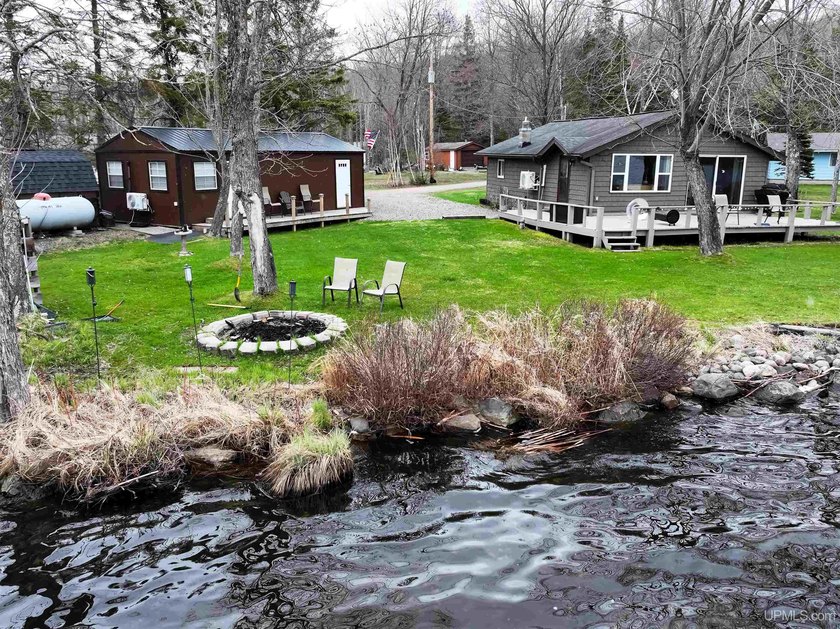 Experience true Northwoods living with this charming waterfront - photo 44